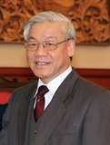 Nguyễn Phú Trọng (born 14 April 1944) is the General Secretary of the Communist Party of Vietnam, elected at the party's 11th National Congress on 19 January 2011. Trong heads the party's Secretariat, as well as the Central Military Commission, the country's two most powerful policymaking bodies.<br/><br/>

Trọng was born in Đông Hội Commune, Đông Anh District, Hanoi. His official biography gives his family background only as 'poor peasant'. He studied philology at Vietnam National University, Hanoi from 1963-67. Trọng officially joined the Communist Party in December 1968. He worked for the Tạp chí Cộng Sản (Communist Review), the theoretical and political agency of the Communist Party of Vietnam  in the periods of 1967-73, 1976–80, and 1983–96. From 1991-96, he served as the editor-in-chief of the Tạp chí Cộng Sản.<br/><br/>

Trọng has been member of the Party's Central Committee since January 1994, member of the Party's Political Bureau since December 1997, and deputy to the National Assembly of the Socialist Republic of Vietnam since May 2002. From January 2000 to June 2006, Trọng was secretary of the Party's Executive Committee of Hanoi, the de facto head of the city authority. On 26 June 2006, Trọng was elected as the Chairman of the National Assembly.