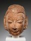 China: Head of a Buddha image from the Kingdom of Khotan, Xinjiang, 6th-7th century